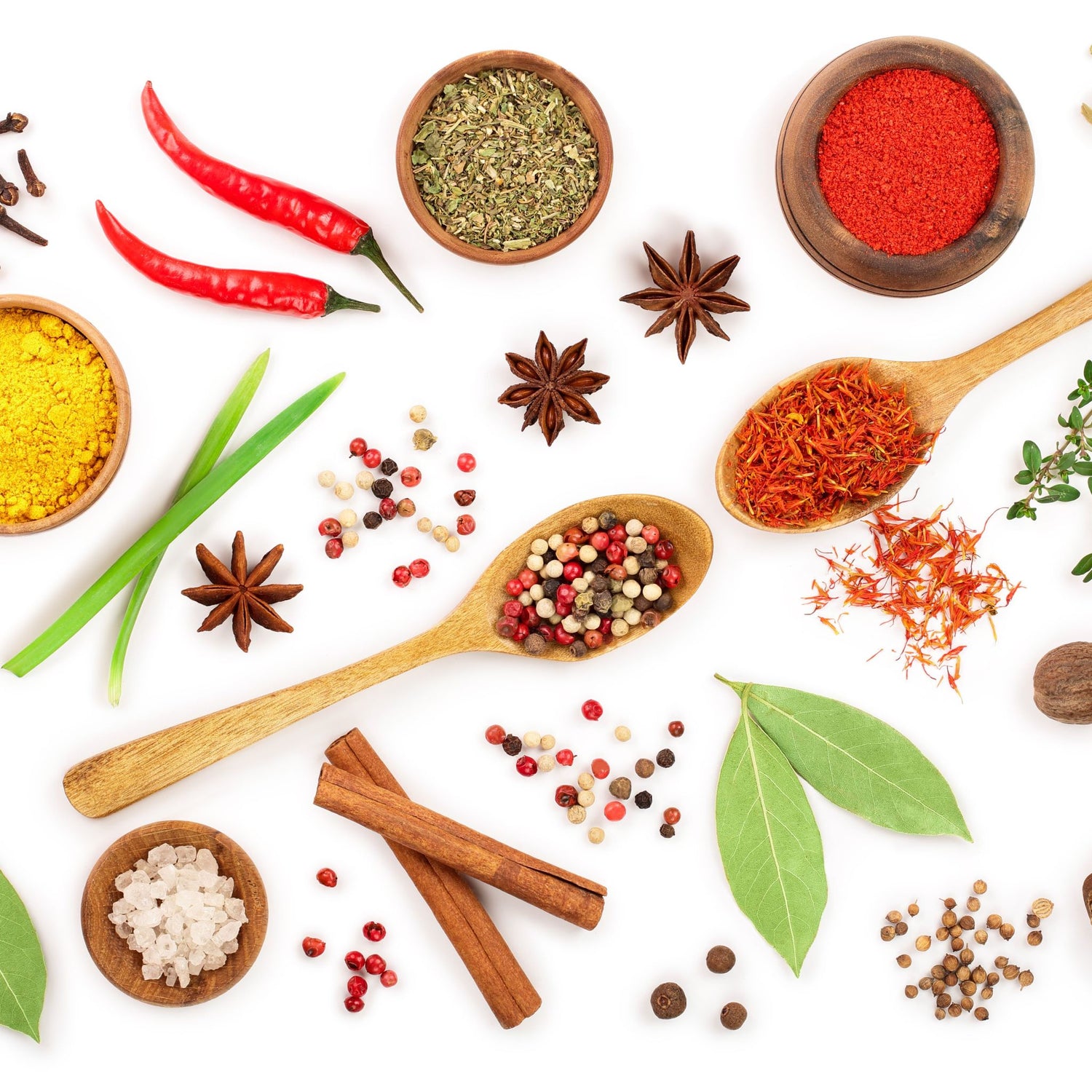 Various spices and herbs on white background
